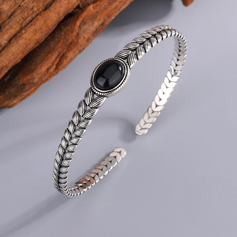 Black onyx bracelet with retro wheat stitching for protection for women.