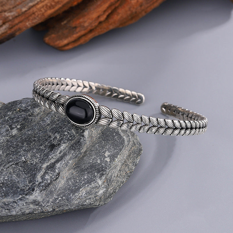 Black onyx bracelet with retro wheat stitching for protection for women.