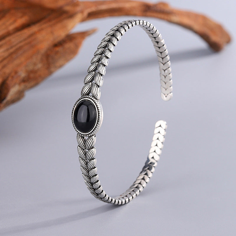 Black onyx bracelet with retro wheat stitching for protection for women.