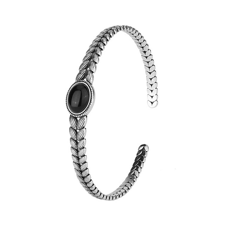 Black onyx bracelet with retro wheat stitching for protection for women.